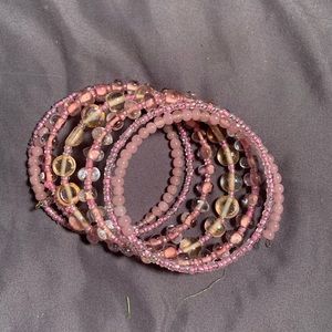 Pink wrap bracelet.